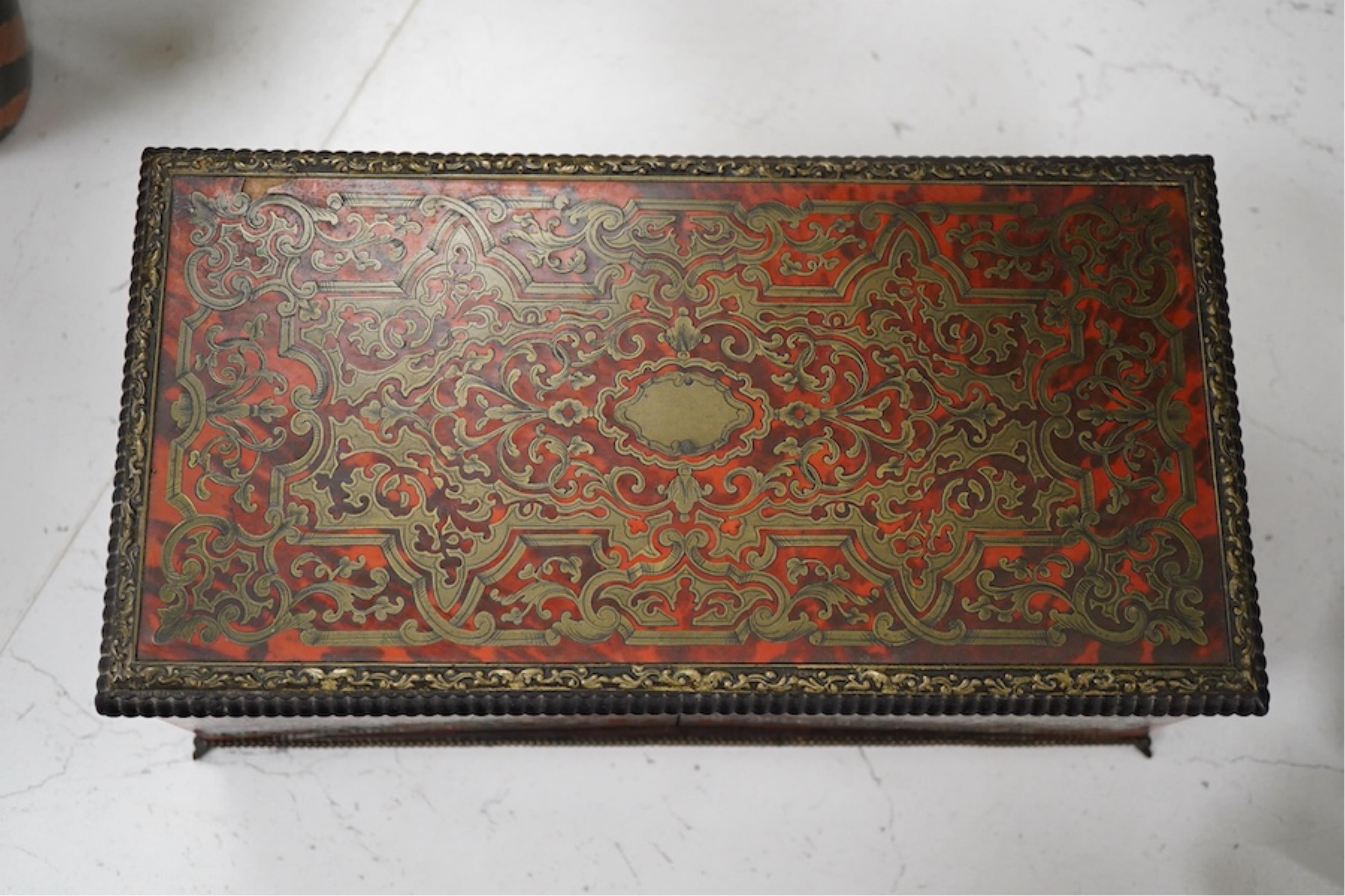 A 19th century French boullework glove box, signed Tahan, Rue de la Paix, width 27cm.